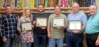 graduates of sewing machine repair school